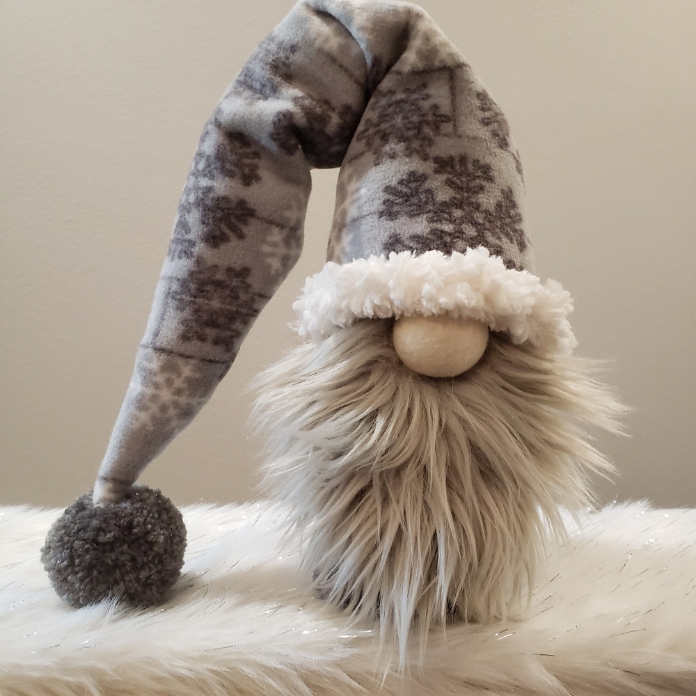 Winter gnome with draped fleece hat